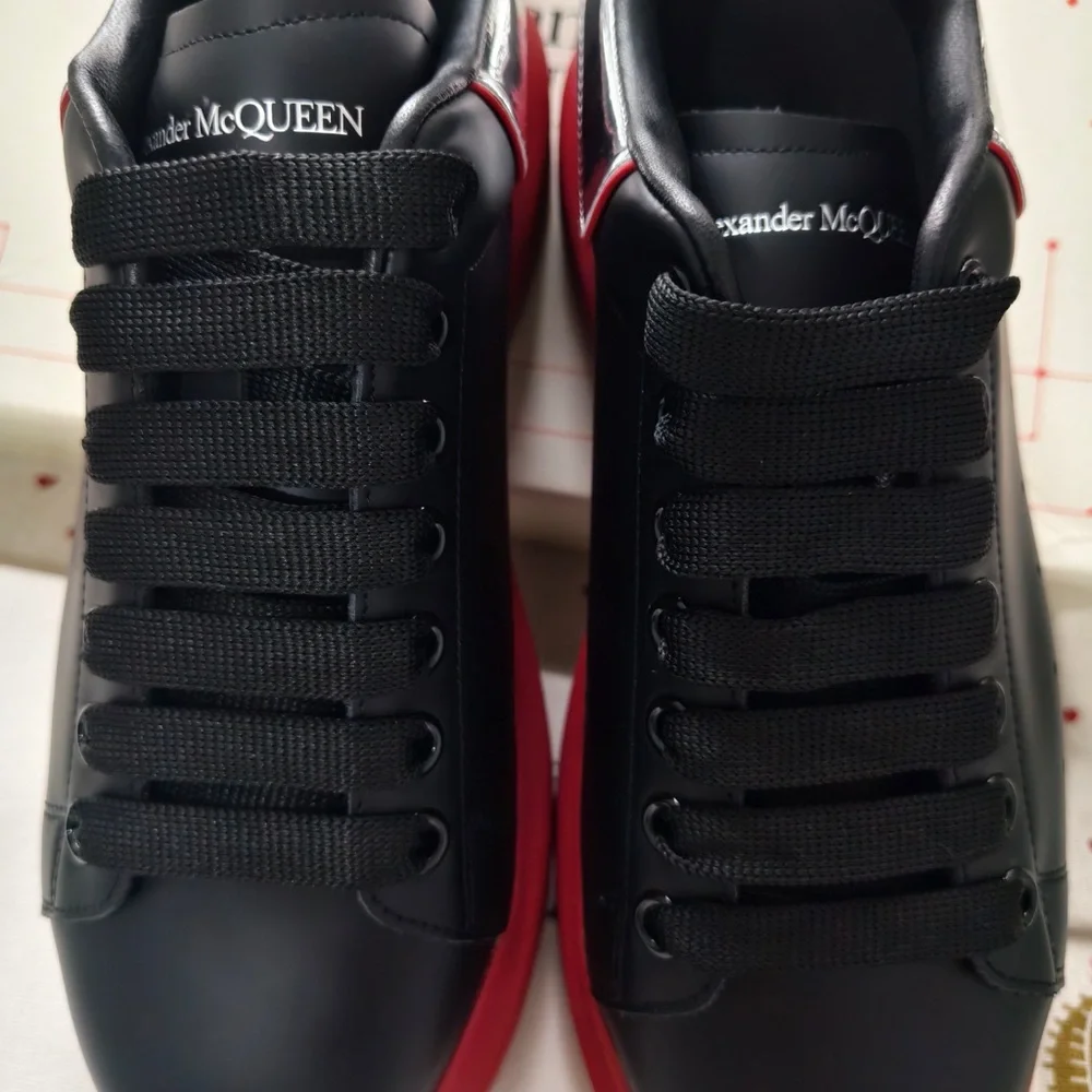 Alexander McQueen Black Leather Sneakers with Red Soles